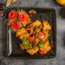 السمك بالفلفل الأحمر والأخضر